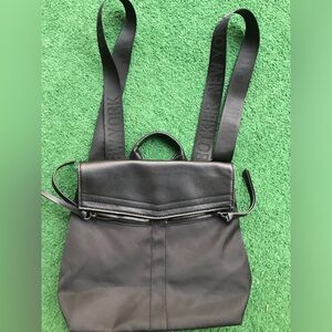 Botkier backpack purse with handle for handbag or embroidered backpack straps.